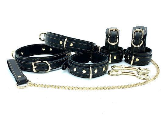  Tango Black BDSM Set featuring the complete luxury leather bondage kit, crafted from black leather and suede with gold stitching and hardware. Includes two durable metal connectors, ideal for sophisticated BDSM leather gear made in the USA."Thigh Cuffs, Collar for Slave, BDSM Hand and Ankle Cuffs 1.5" 