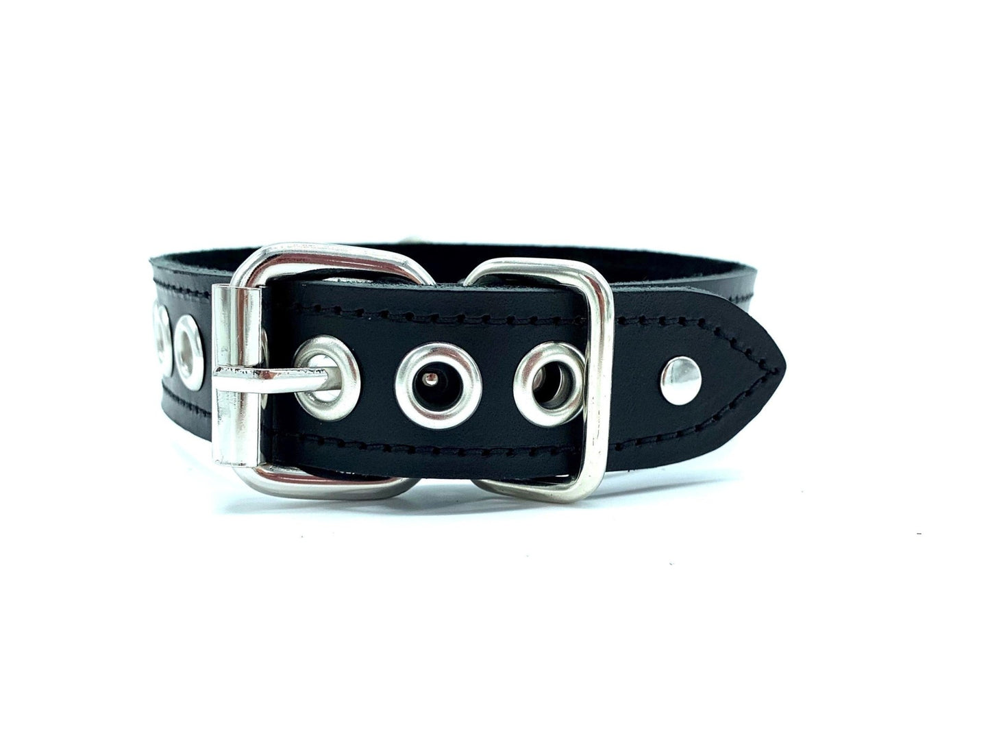 Close up of the buckle closure with metal eyelets in the adjusting holes