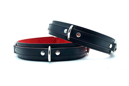 Front View Showing D-Rings: Front view of Scarlet Italian leather BDSM bondage thigh cuffs, showcasing sturdy D-rings attached, crafted with vibrant scarlet Italian leather made in the USA.