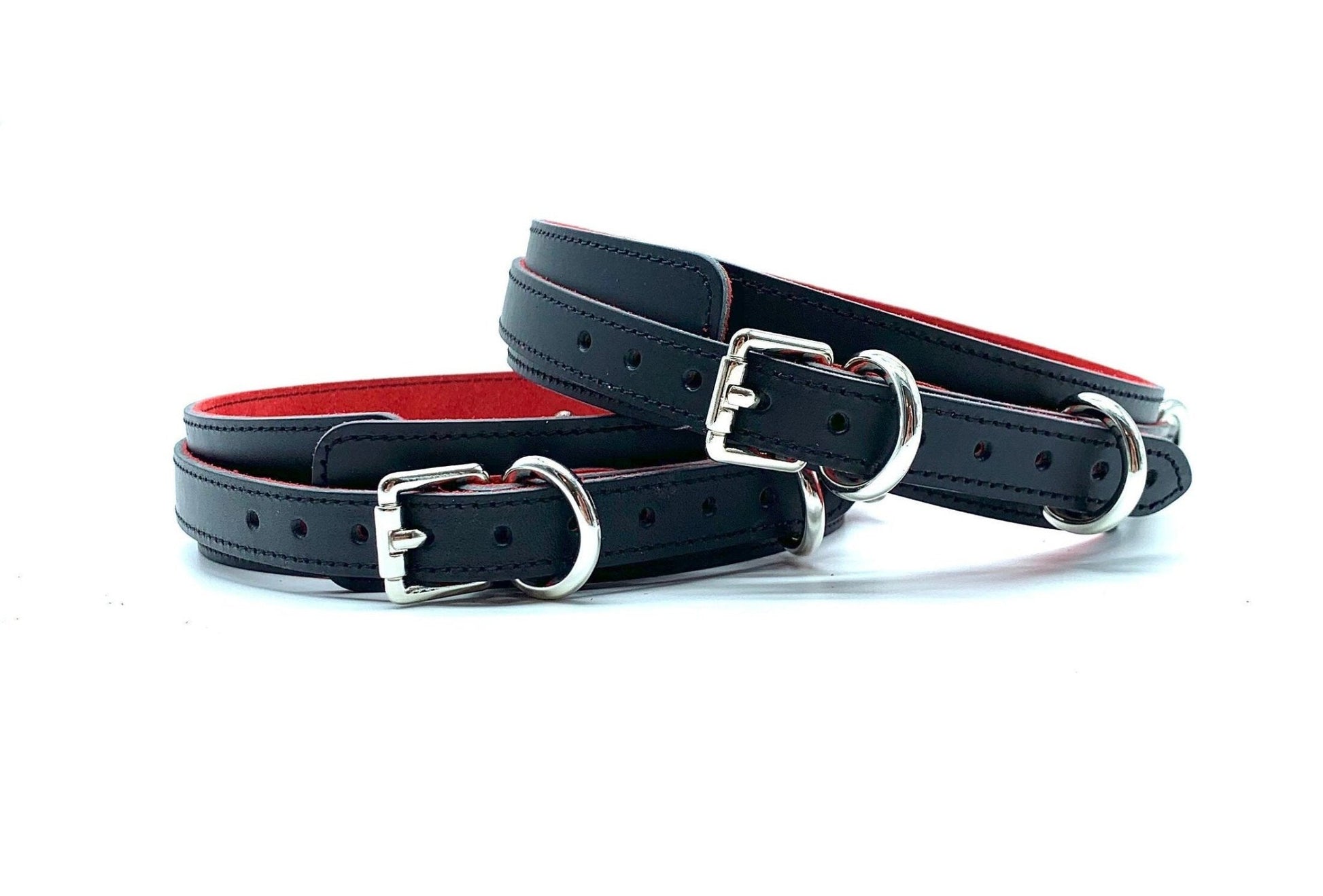 Back View Showing Buckles: Back view of Scarlet Italian leather BDSM bondage thigh cuffs, displaying the polished silver buckles, emphasizing the high-quality Italian leather craftsmanship from the USA.