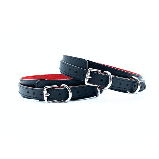 Pair of black leather thigh cuffs with red suede lining and silver buckles, Scarlet Italian leather restraint cuffs