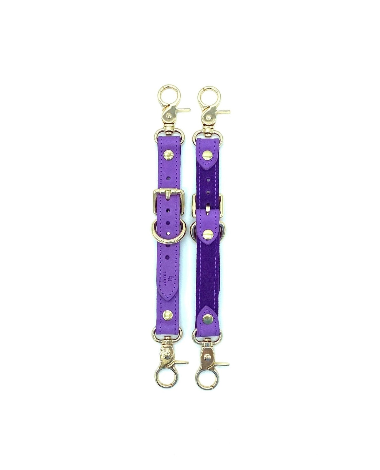 Rich Tango Purple Italian leather garters designed by Lulexy in the USA, featuring a smooth Italian suede interior. The deep purple leather is paired with sturdy, nickel-plated hardware for a luxurious BDSM experience.