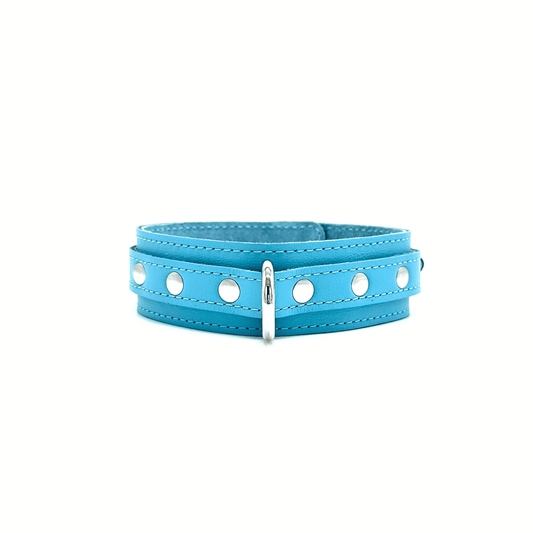 Soft leather collar in light blue with shiny silver hardware and detailed stitching.