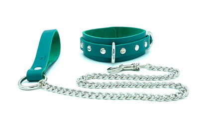 Close-up of the Candice Collection's collar and leash, highlighting the intricate beauty of the teal leather complemented by sleek silver hardware. This set combines elegance with practical BDSM functionality.