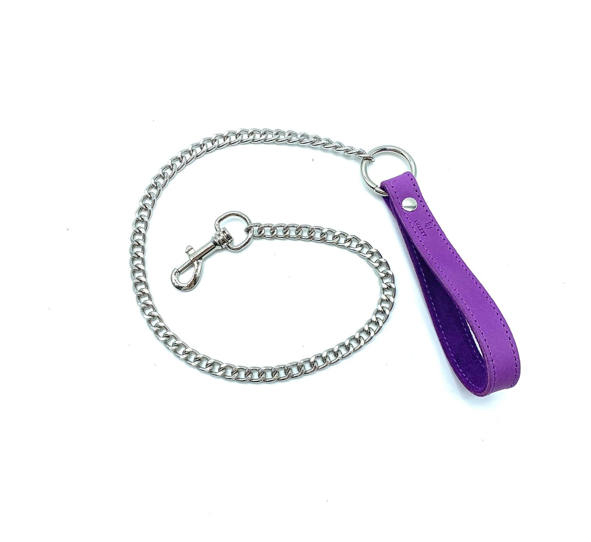 Purple leather leash from the Tango Purple BDSM Set, featuring a durable silver chain, perfect for role-playing dominance and enhancing submissive experiences.