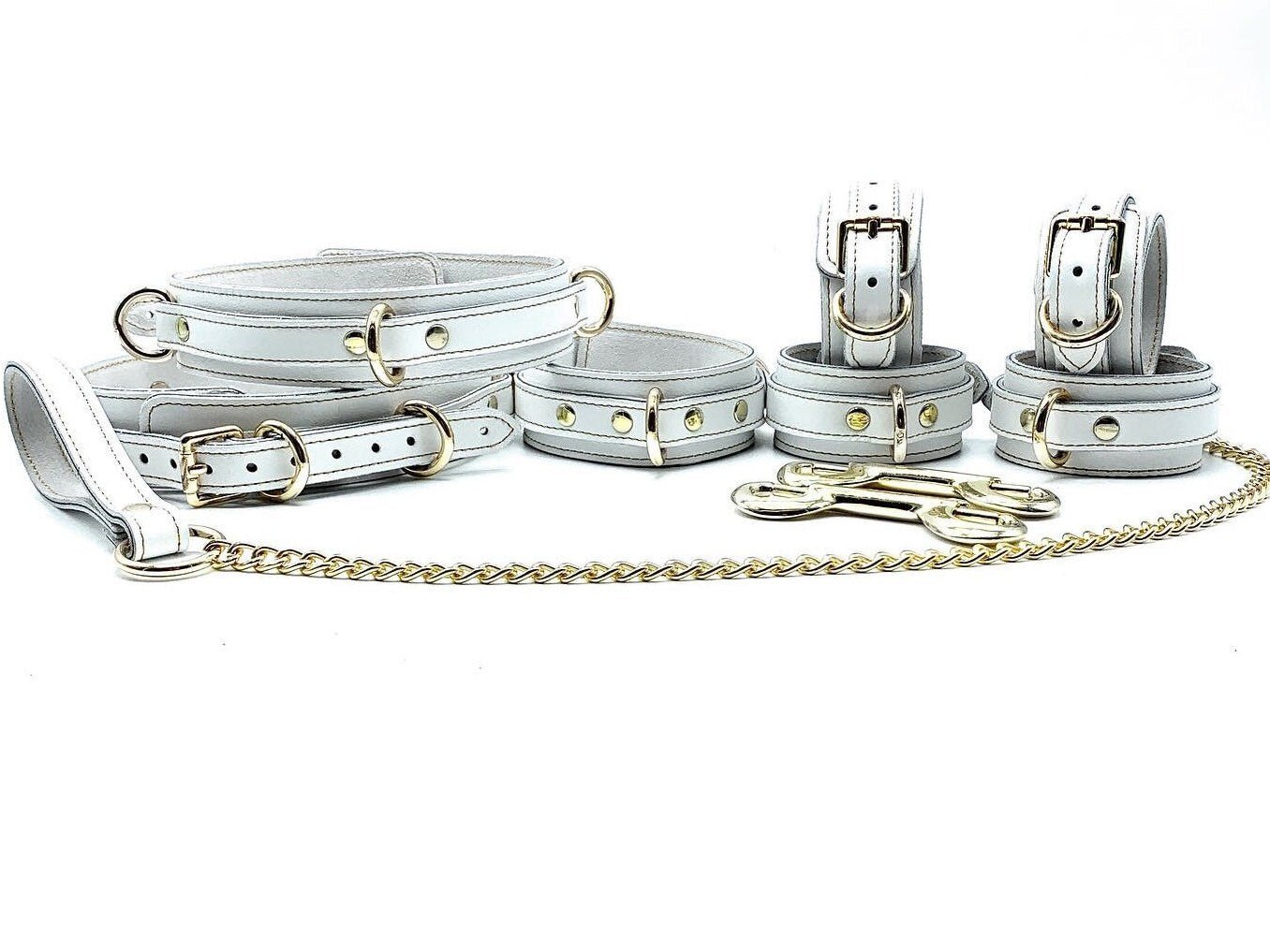 White Italian leather 7 piece Vienna bondage set with gold hardware, collar, leash, cuffs and connectors