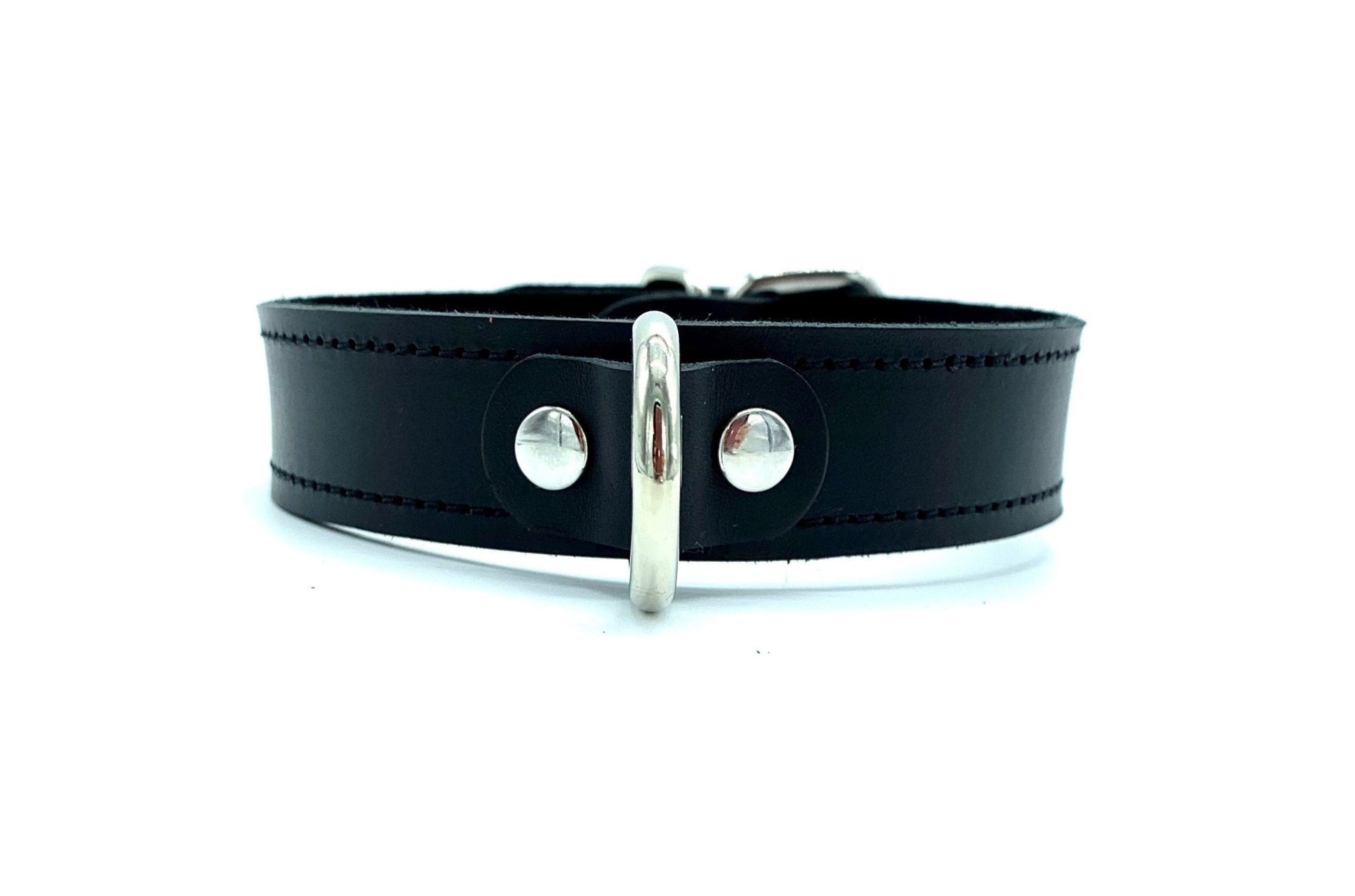 Black Italian leather day collar 1" wide. It ha black stitching and metal D ring in the center