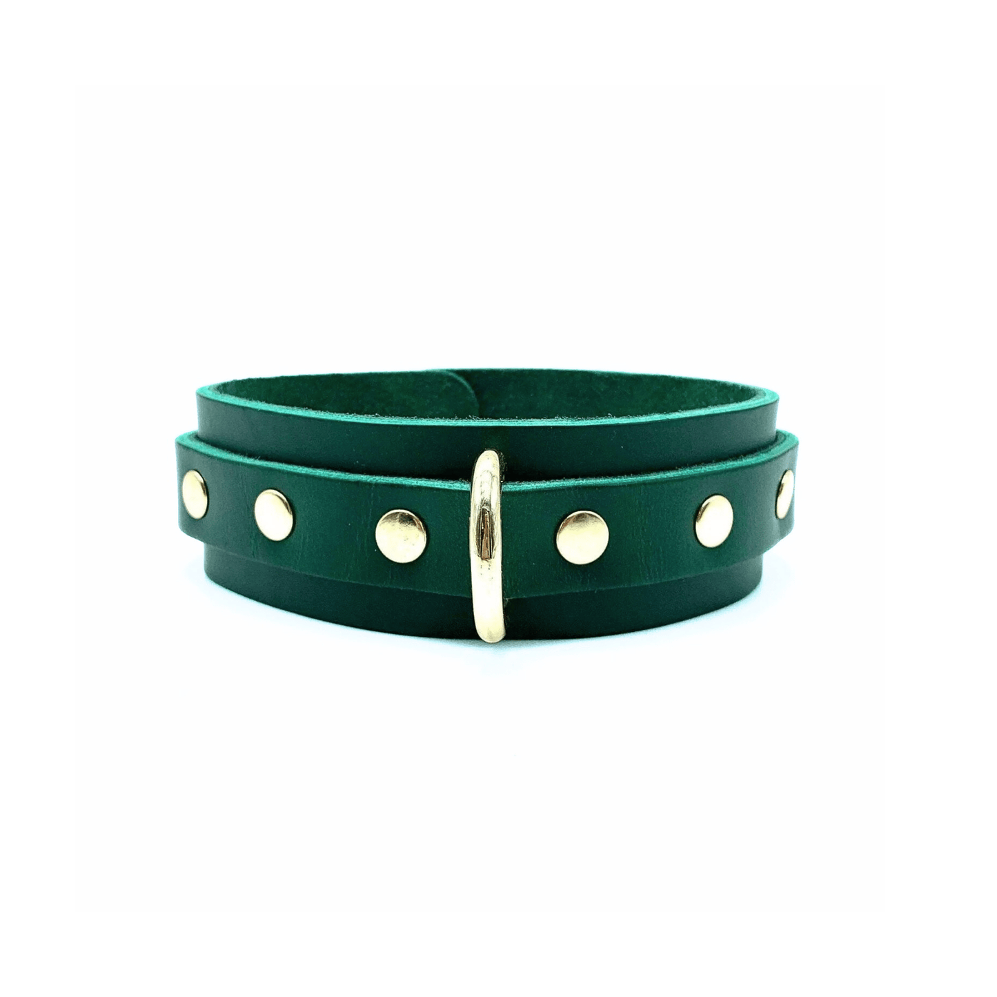 Green leather collar 1.5 inch wide with center D ring and gold rivets on each side of the ring.