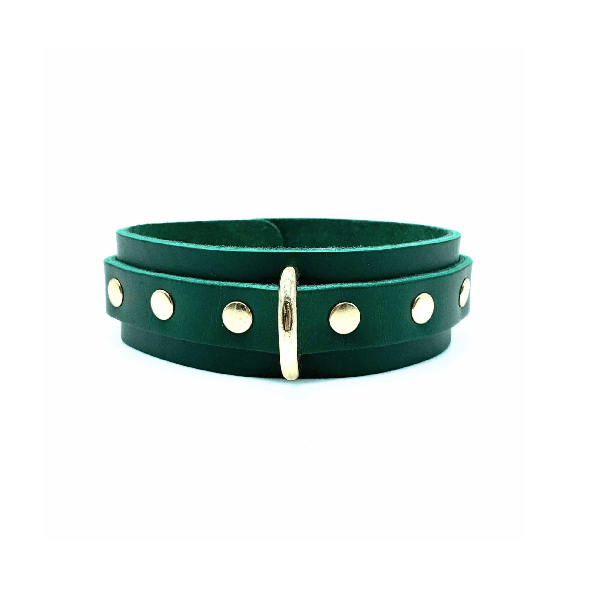 Green leather collar 1.5 inch wide with center D ring and gold rivets on each side of the ring.