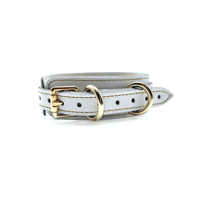 Back view of white leather collar, showcasing elegant gold buckle, multiple adjustment holes and detailed stitching.