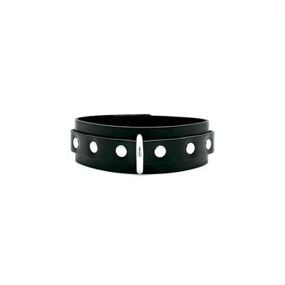 Black Italian leather collar with shiny silver D ring and 3 silver rivets on each side of the ring. 