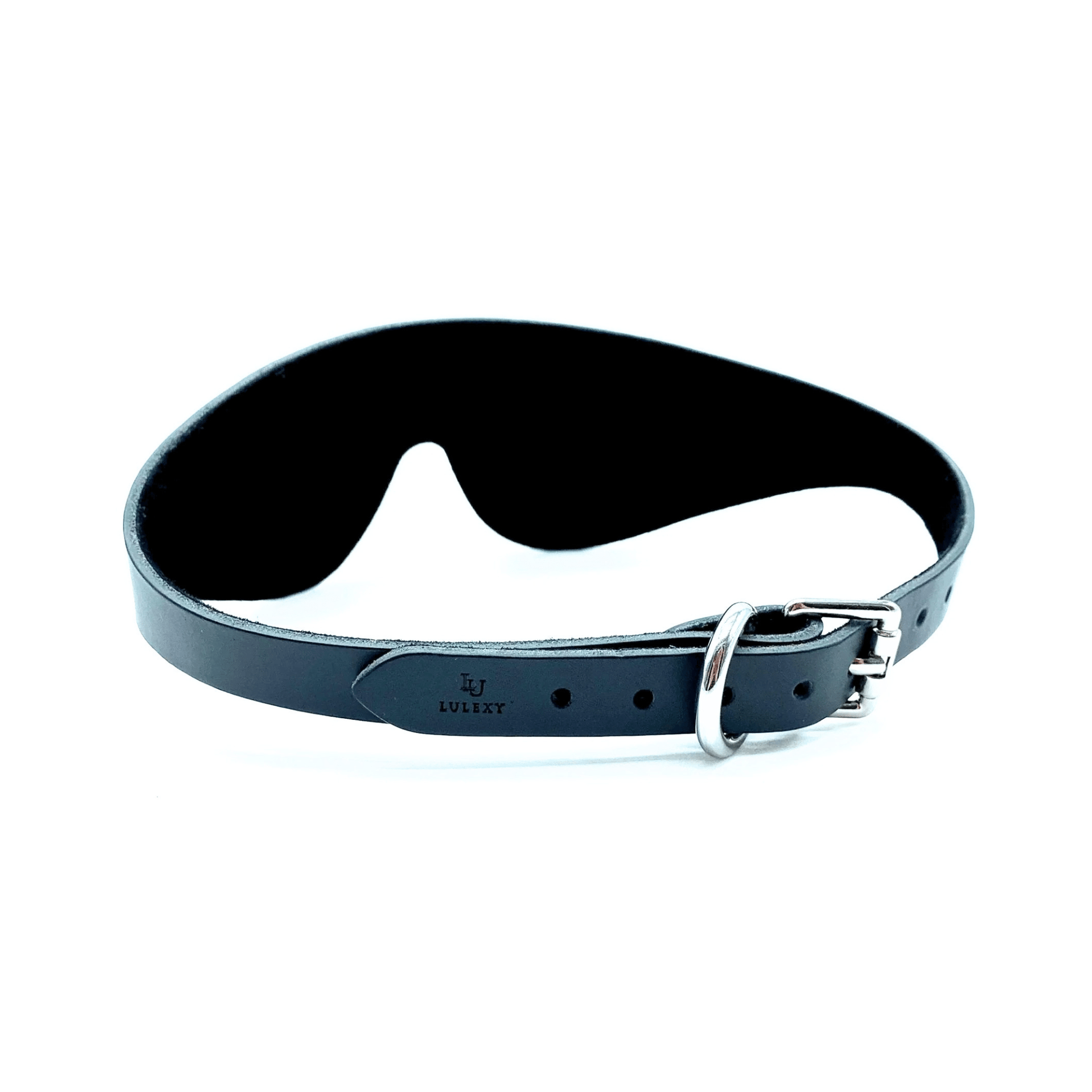 Black leather blindfold side view with strap, adjustable buckle and smooth finish