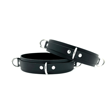 Black Italian leather thigh cuffs with silver hardware, adjustable straps handcrafted in USA