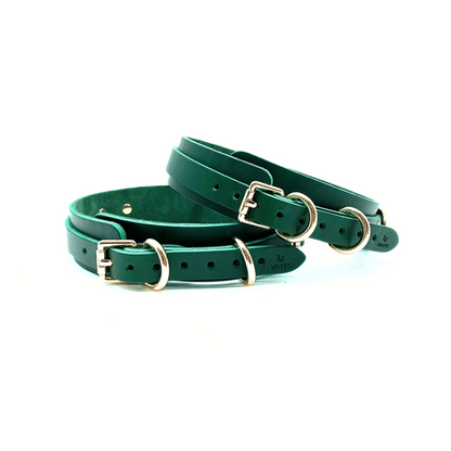 Green Buttero Italian leather thigh cuffs with gold hardware, paired adjustable cuffs with smooth finish