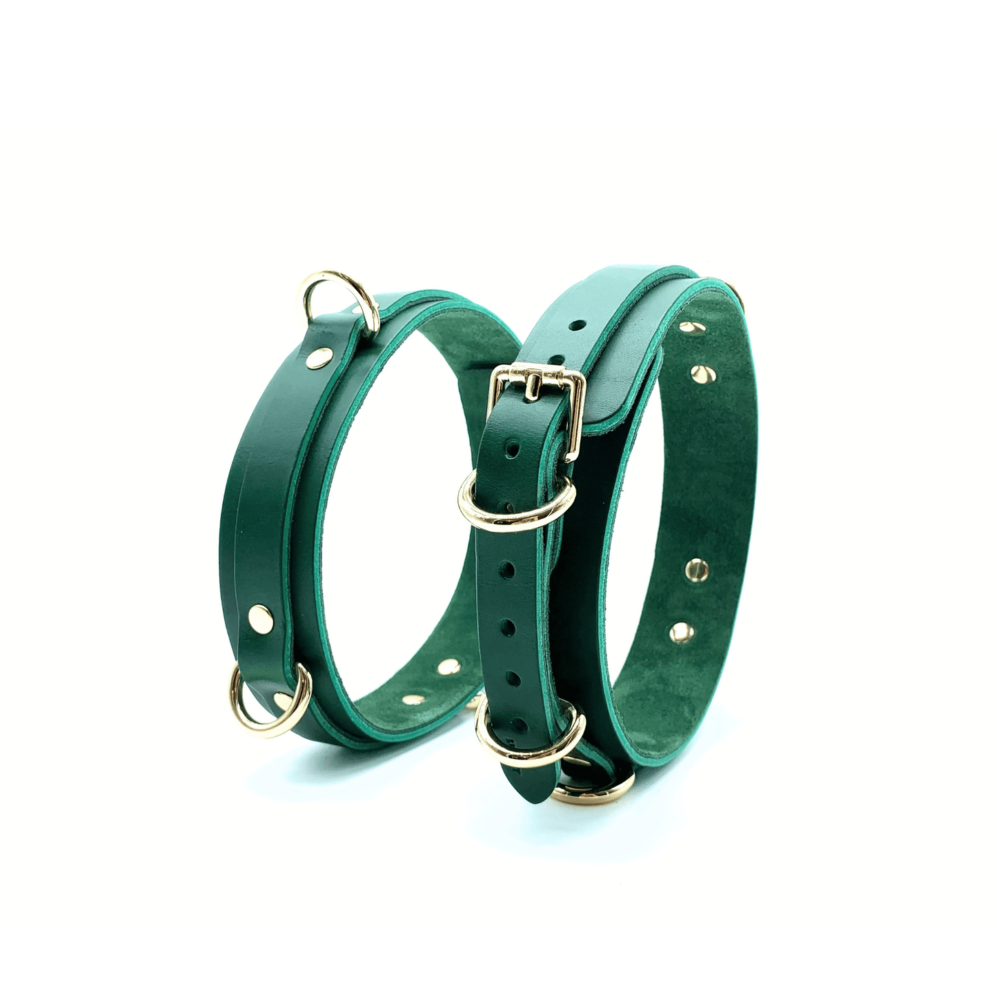 Green Italian leather thigh cuffs with gold hardware, adjustable straps with buckle and rivet detail