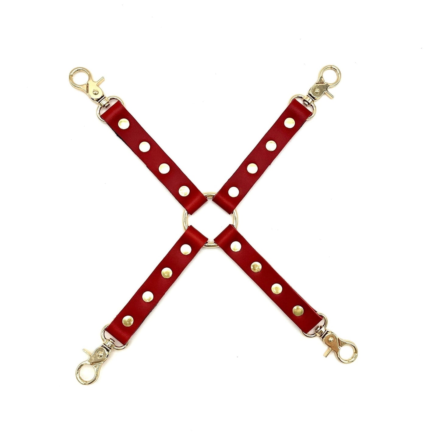 Red leather 4 way hogtie connector with gold hardware, 4 easy release snap hooks and center O-ring for bondage restraints.
