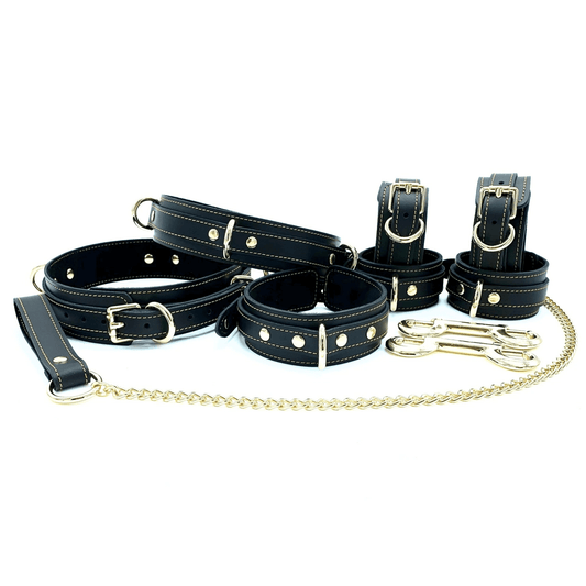 Tango 7 piece black leather bondage set with gold hardware, collar, leash, wrist cuffs, ankle cuffs, thigh cuffs and connectors