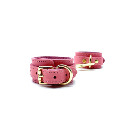 Pink leather handcuffs with gold hardware, smooth leather cuffs with adjustable strap