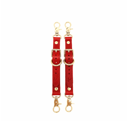 Red Buttero Italian leather garter straps with gold hardware, adjustable connectors with clips