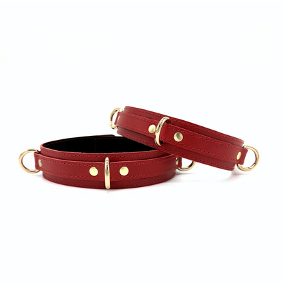 Red Buttero Italian leather thigh cuffs with gold hardware, adjustable cuffs with smooth structured design