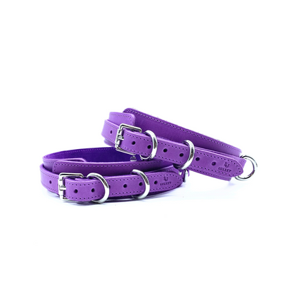 Purple leather thigh cuffs featuring elegant silver buckles, detailed stitching and embossed Lulexy logo