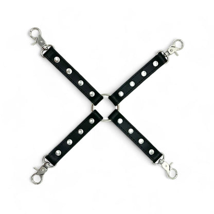 Black leather hogtie connector with silver hardware and center O-ring for bondage restraints.
