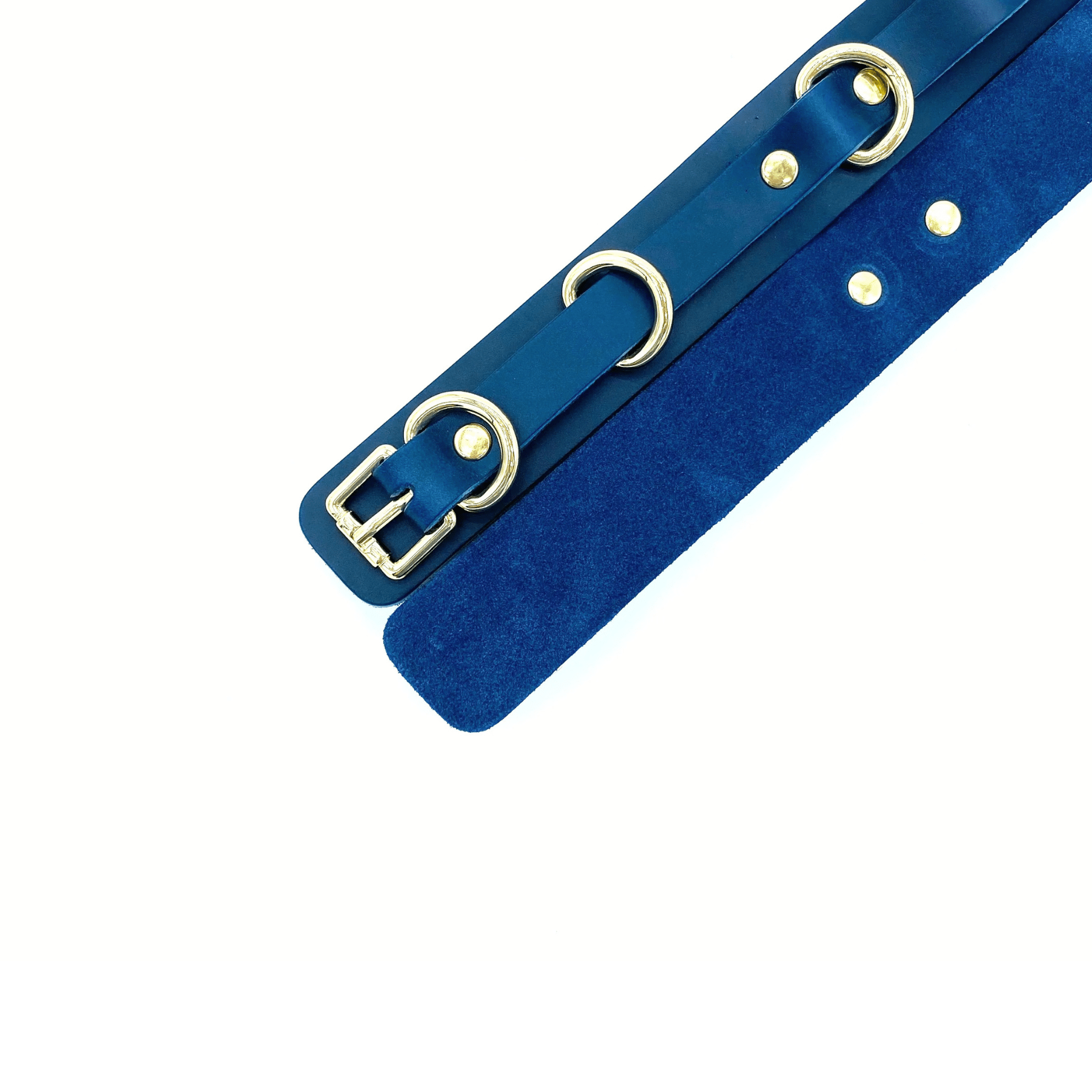 Navy blue leather thigh cuffs with gold hardware, front and back view showing smooth exterior and blue suede lining