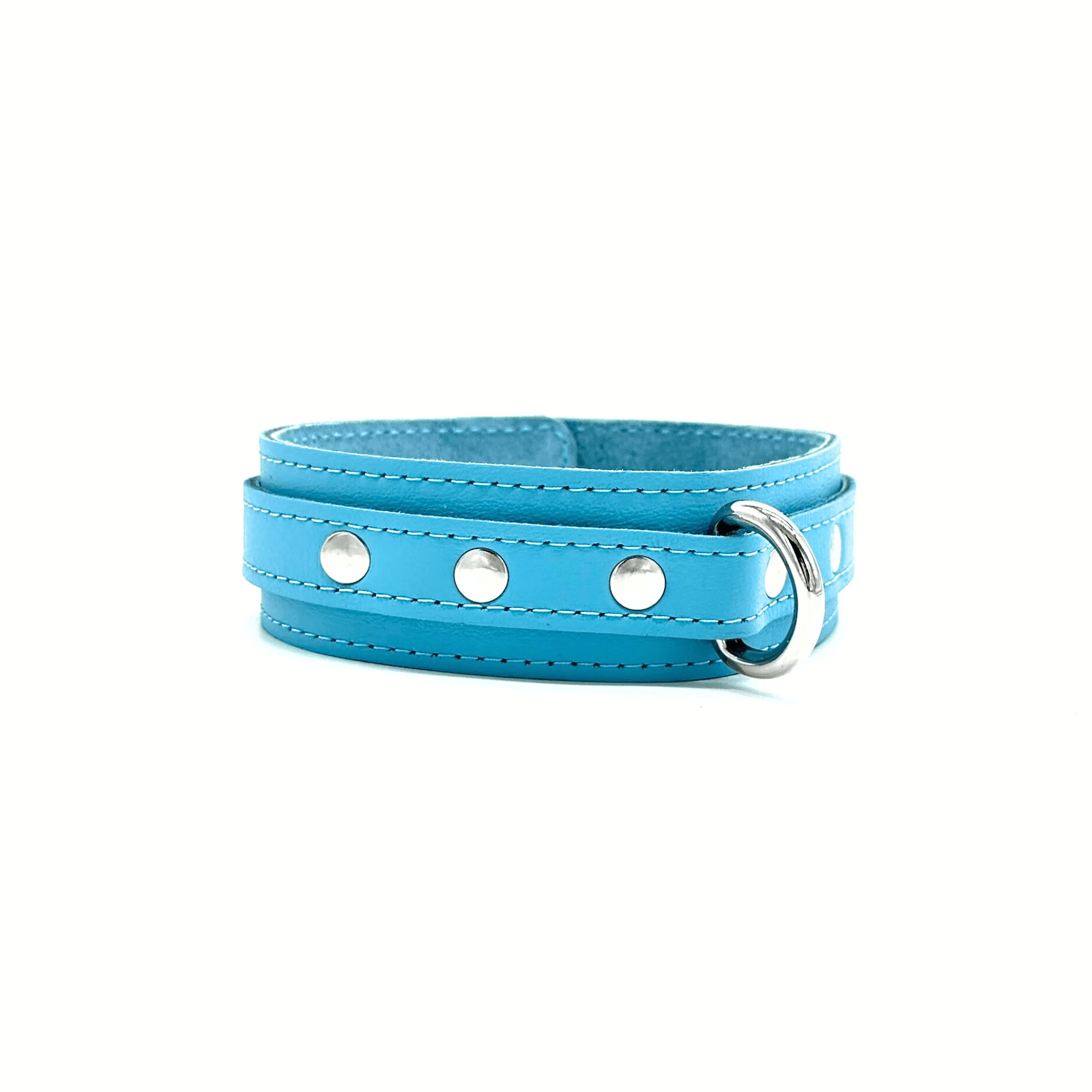 Side view of soft Italian leather collar in light blue with the focus on detailed stitching and silver D ring and rivets